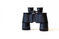 old black hiking binoculars on white background Royalty Free Stock Photo
