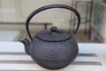 Old black iron tea pot Royalty Free Stock Photo
