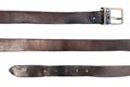 Old black leather belt on white Royalty Free Stock Photo