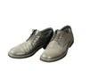 Old black men dusty leather shoes isolated on black background, unemployment concept Royalty Free Stock Photo