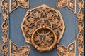 Old, black metal door decorated with bronze ornament Royalty Free Stock Photo