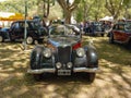 Old black and red 1943 Riley RMB 2.5 in a park. Nature, trees. Autoclasica 2022 classic car show Royalty Free Stock Photo