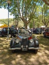 Old black and red 1943 Riley RMB 2.5 in a park. Nature, trees. Autoclasica 2022 classic car show Royalty Free Stock Photo