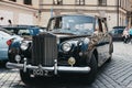 Old Black Rolls Royce car on a street in Prague, Czech Republic Royalty Free Stock Photo