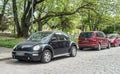 Old small black compact car Volkswagen New Beetle I