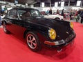 Old black sport 1967 Porsche 912 speedster coupe on the red carpet. Exhibit hall. Classic car show