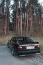 Old black tuned Mercedes Benz C-class W202 model Royalty Free Stock Photo