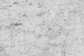 Old black white dirty tattered paper bulletin board surface texture light background Royalty Free Stock Photo