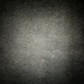 Old black and white wall in spots, cracks, stains. Grey painted concrete wall in abstract grunge style. Grunge loft background tex Royalty Free Stock Photo