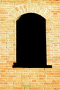Old black window with red brick wall background Royalty Free Stock Photo