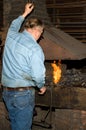 Old Blacksmith at the Forge Royalty Free Stock Photo