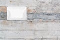 Old blank metal plate on concrete wall Royalty Free Stock Photo