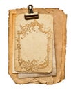 Old blank paper sheets with golden ornament