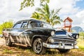 Old blcak american retro car parked in Vinales, Cuba Royalty Free Stock Photo