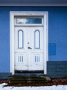 Old blie und white entrance door, porch view