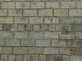 Old block wall with embossed texture