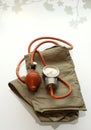 Old blood pressure cuff isolat Royalty Free Stock Photo