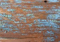 Old blue board with cracked paint, vintage wood background, grunge plank. Old wooden background with remains of pieces of scraps Royalty Free Stock Photo