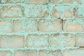 Old blue brick wall with peeling paint. Royalty Free Stock Photo