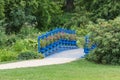 Old blue bridge in the Fuerst Pueckler park in Bad Muskau Royalty Free Stock Photo