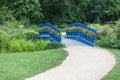 Old blue bridge in the Fuerst Pueckler park in Bad Muskau Royalty Free Stock Photo