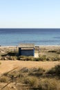 Old blue cabin on the beach in Santa Pola