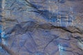 A old blue canvas fabric with crease and holes. rough surface texture