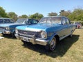Old blue 1966 Chevrolet Chevy Nova 400 super sedan in a park. Autoclasica 2022 classic car show.