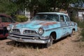 Old blue 1955 Chrysler New Yorker abandoned in the yard Royalty Free Stock Photo