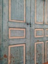 old blue door with peeling paint Royalty Free Stock Photo