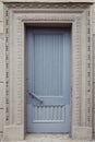 Old door in a platband Royalty Free Stock Photo