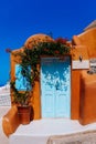 Old blue door, traditional Greek architecture, Santorini island, Greece. Royalty Free Stock Photo