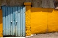 Old blue door and yellow wall at Ugakro cultural village in Incheon, Korea