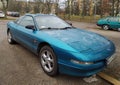 Old blue Ford Probe coupe car parked