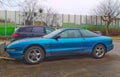 Old blue Ford Probe coupe car parked