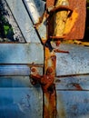 A Very Rusty Car Door Hinge JointAnd Metal