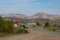 Old blue and green truck leaving for refueling from a gas station near Karmir Shuka on the Janapar Trail in Nagorno Karabakh in