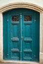 Old blue historical rustic wooden house door in Europe, Czech republic Royalty Free Stock Photo