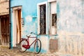 Old blue house with a bicycle. Colorful houses in Burano island near Venice, Italy Royalty Free Stock Photo