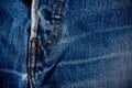 Old blue jeans seam detail cloth of denim for pattern and classic background close up Royalty Free Stock Photo