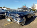 Old blue luxury 1957 Cadillac sedan De Ville four door in a parking. Classic car show. Royalty Free Stock Photo