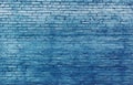 Old blue painted brick wall texture or background. High contrast and resolution image with place for text. Template for design Royalty Free Stock Photo