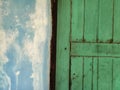 old blue painted cement wall and wooden window background Royalty Free Stock Photo