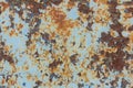 An old blue painted wall with spots and streaks of rust.Rusty metal background. Rust stains Royalty Free Stock Photo