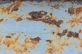 An old blue painted wall with spots and streaks of rust.Rusty metal background. Rust stains Royalty Free Stock Photo