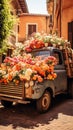 Old blue pickup used as a planter for flowers