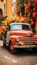 Old blue pickup used as a planter for flowers