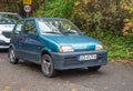 Old blue Polish small Fiat Cinquecento parked