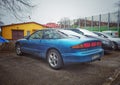 Old blue Ford Probe coupe car parked