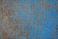 Old blue rusty metal sheet of iron with a pattern. rough surface texture Royalty Free Stock Photo